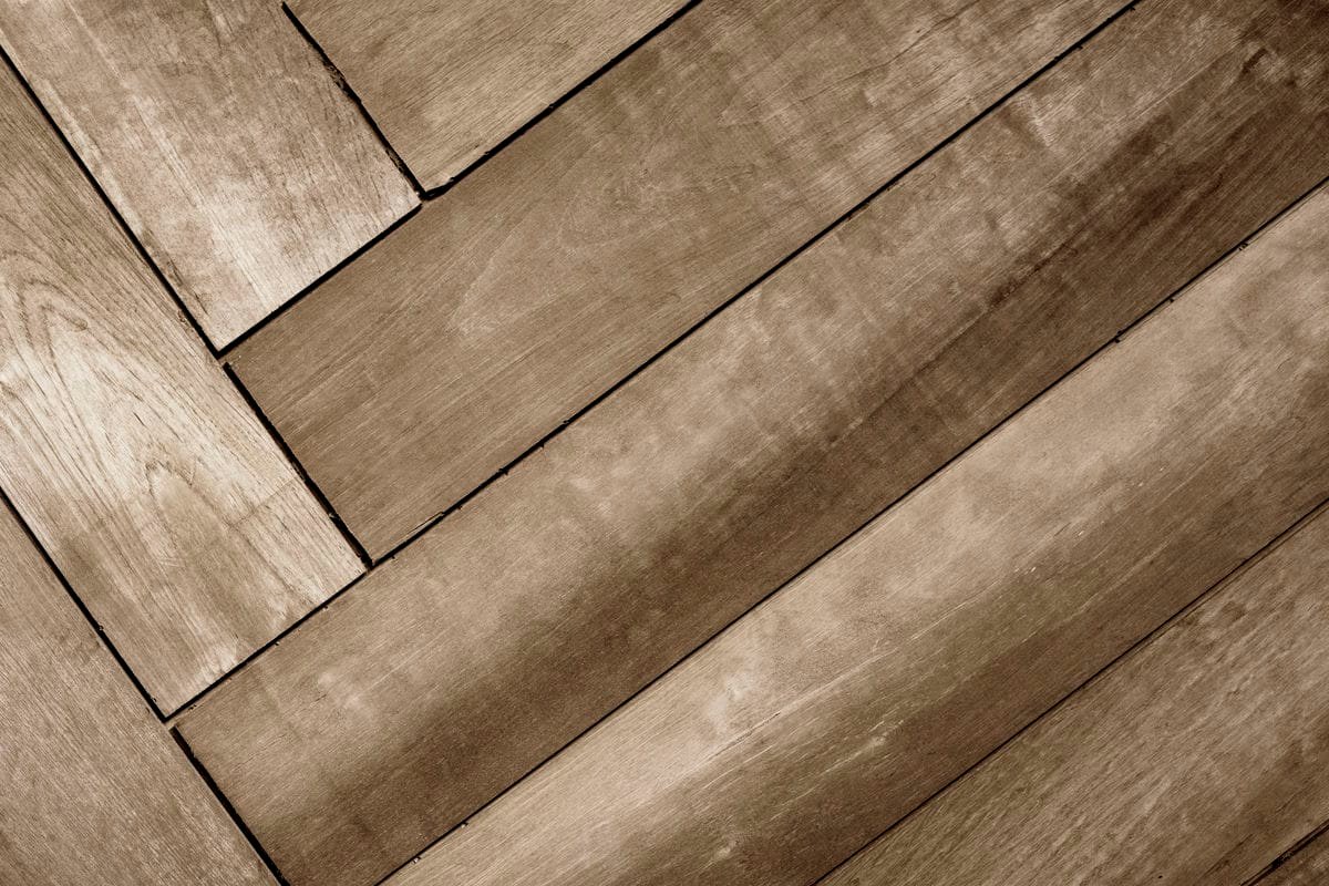 Durable maple hardwood floor with a glossy finish in a Milwaukee home bathroom.