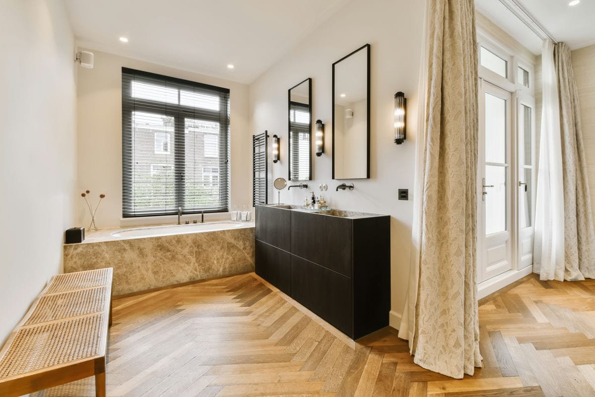 Warm and cozy bathroom in Milwaukee with rich mahogany hardwood flooring.